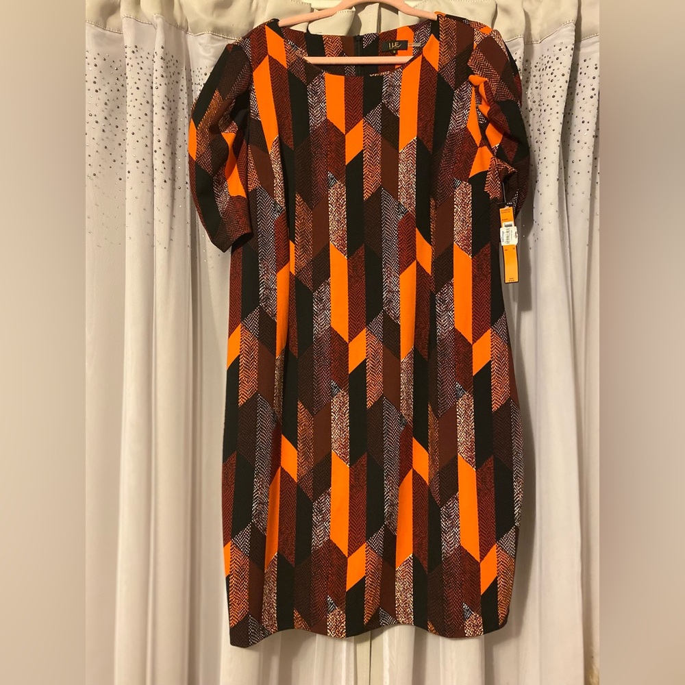 Brand- ILE New York
Size- 16, PTP- 22”, Length- 39 1/2”
Color- Br., Bl., Org.
